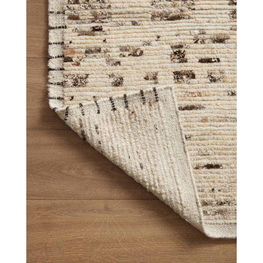 Amber Lewis x Loloi Briyana Natural / Granite Rug combines the incredible ribbed texture of Moroccan rugs with clean, contemporary design, thanks to Lewis’s careful eye for details.  Amethyst Home provides interior design services, furniture, rugs, and lighting in the Omaha metro area.
