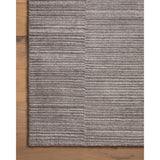 Sleek and modern, the Lou Collection is a luxurious hand-loomed area rug by Amber Lewis x Loloi. While the rug presents a minimal aesthetic, up close, it has a broken stripe pattern that creates a slightly ribbed effect. It’s made with a blend of wool and viscose that’s soft and durable, an elevated neutral for any room. Amethyst Home provides interior design, new home construction design consulting, vintage area rugs, and lighting in the Charlotte metro area.