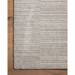 Sleek and modern, the Lou Collection is a luxurious hand-loomed area rug by Amber Lewis x Loloi. While the rug presents a minimal aesthetic, up close, it has a broken stripe pattern that creates a slightly ribbed effect. It’s made with a blend of wool and viscose that’s soft and durable, an elevated neutral for any room. Amethyst Home provides interior design, new home construction design consulting, vintage area rugs, and lighting in the Miami metro area.