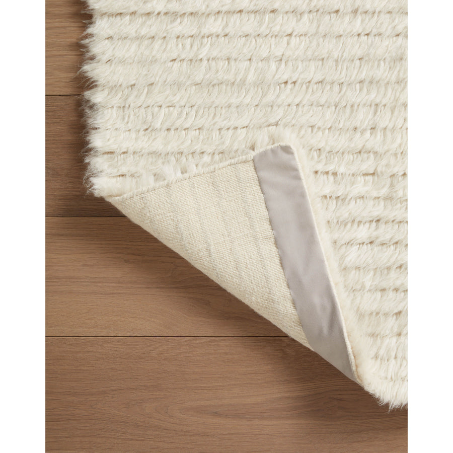 The Amber Lewis x Loloi Woodland Ivory Rug has a lush, soft pile inspired by the tree-lined city of Woodland, California. A slightly ridged construction adds dimension and movement to this stylish, modern rug. Amethyst Home provides interior design services, furniture, rugs, and lighting in the Omaha metro area.