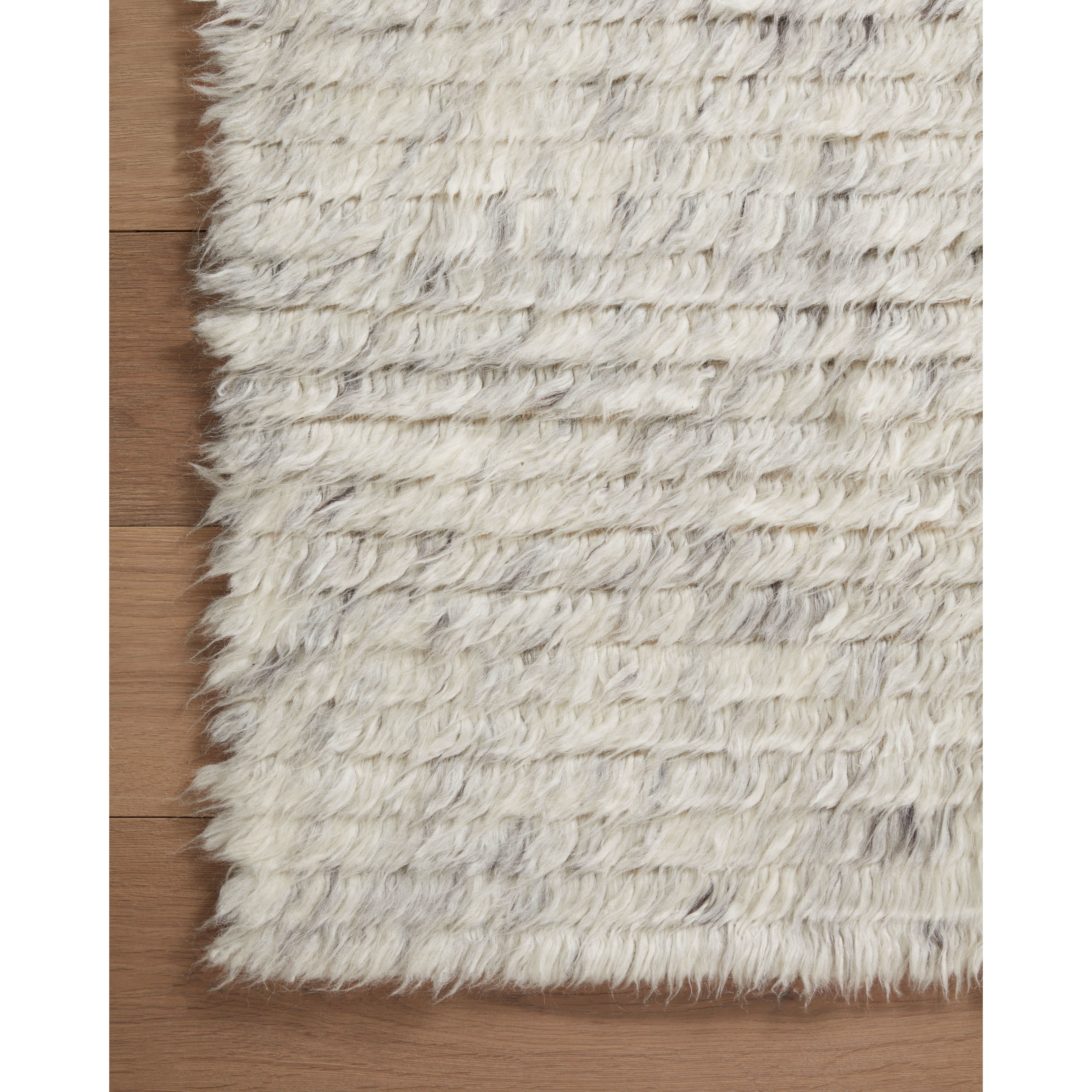 The Amber Lewis x Loloi Woodland Silver Rug has a lush, soft pile inspired by the tree-lined city of Woodland, California. A slightly ridged construction adds dimension and movement to this stylish, modern rug. Amethyst Home provides interior design services, furniture, rugs, and lighting in the Des Moines metro area.