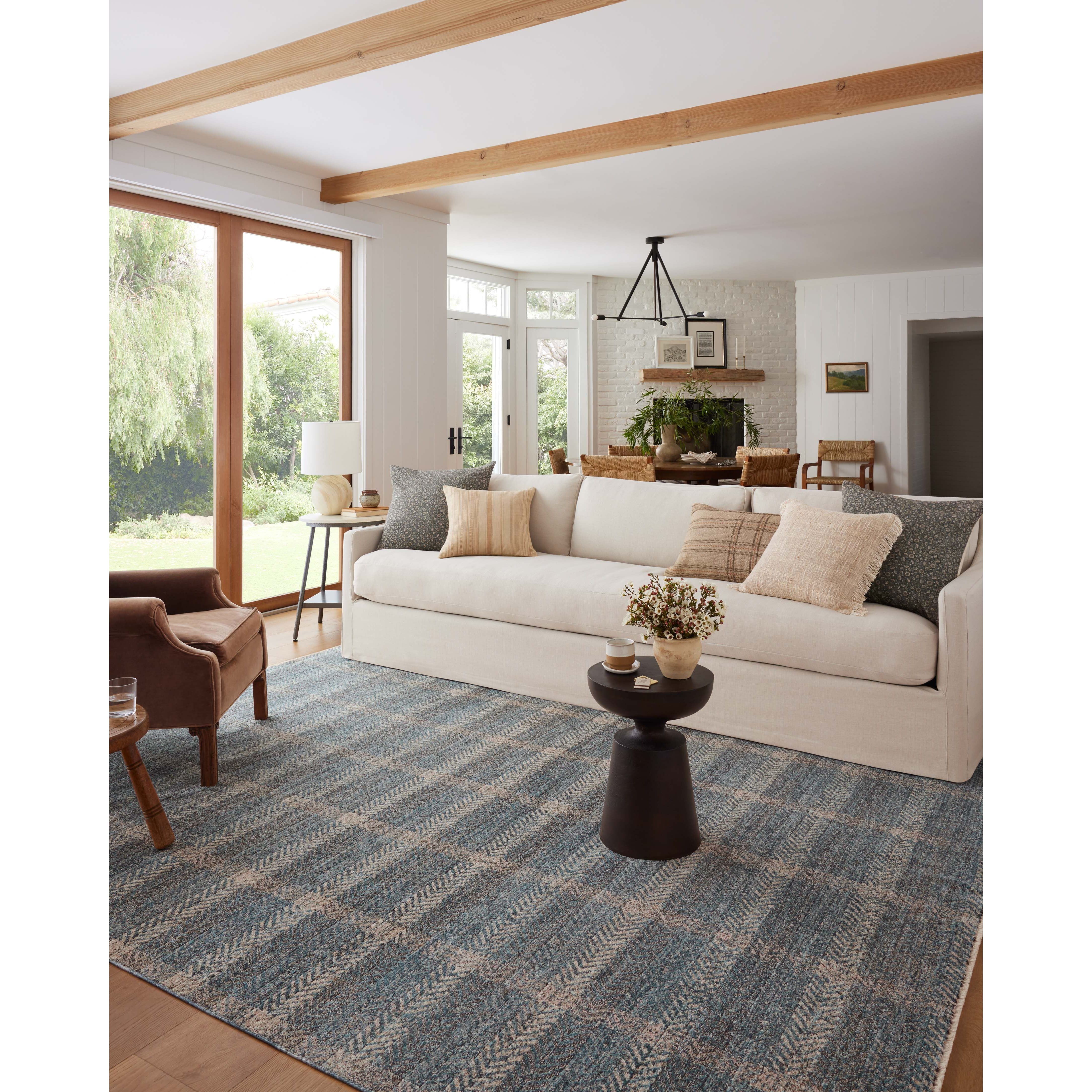 The Ember Collection by Angela Rose x Loloi is a modern flatweave area rug with a timeless plaid pattern that adds depth and coziness to any living room, bedroom, dining room, or hallway. Ember is power-loomed of 100% space-dyed polyester, a durable construction that creates a nuanced depth of color, available in a range of neutral palettes. Amethyst Home provides interior design, new home construction design consulting, vintage area rugs, and lighting in the Washington metro area.