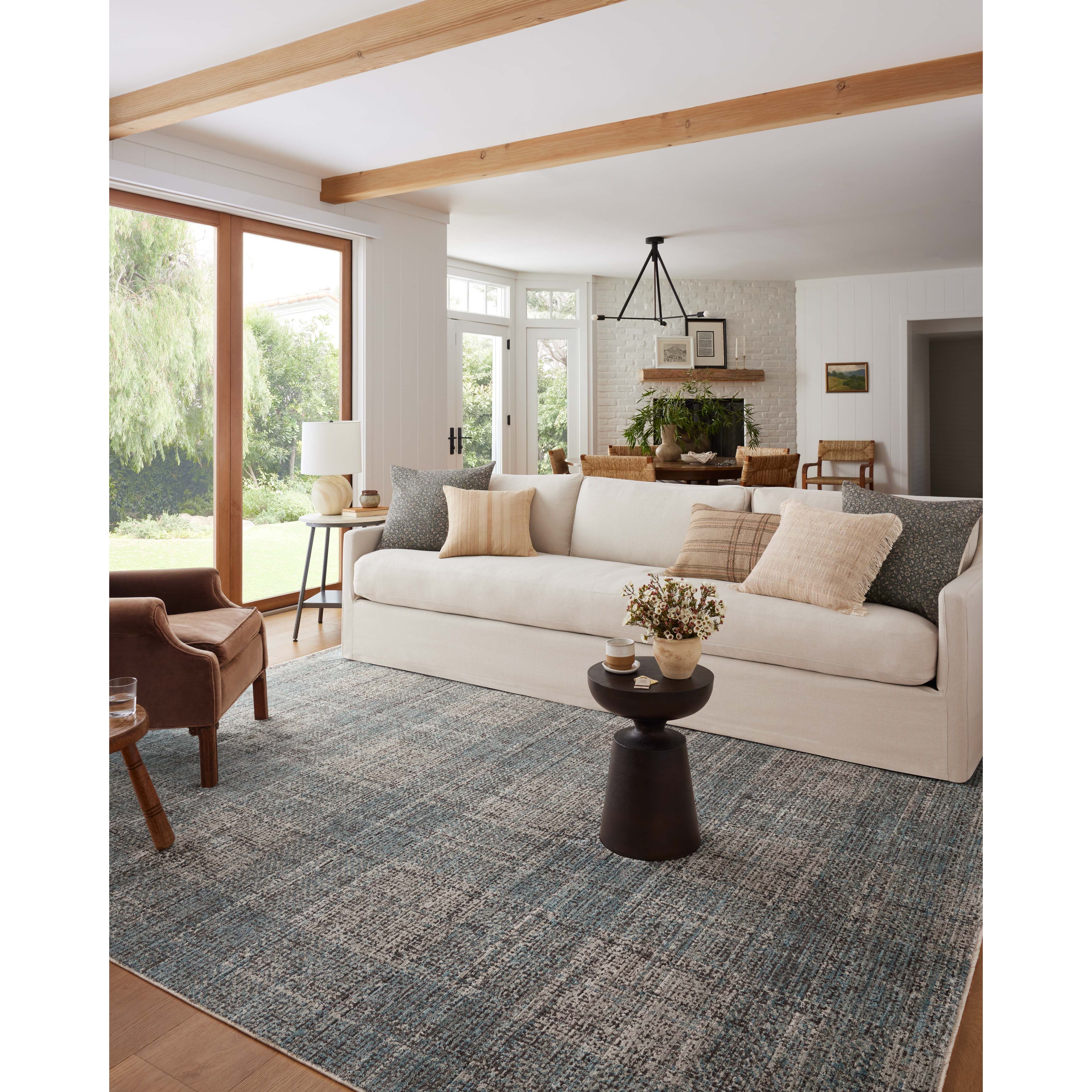 The Ember Collection by Angela Rose x Loloi is a modern flatweave area rug with a timeless plaid pattern that adds depth and coziness to any living room, bedroom, dining room, or hallway. Ember is power-loomed of 100% space-dyed polyester, a durable construction that creates a nuanced depth of color, available in a range of neutral palettes. Amethyst Home provides interior design, new home construction design consulting, vintage area rugs, and lighting in the Calabasas metro area.