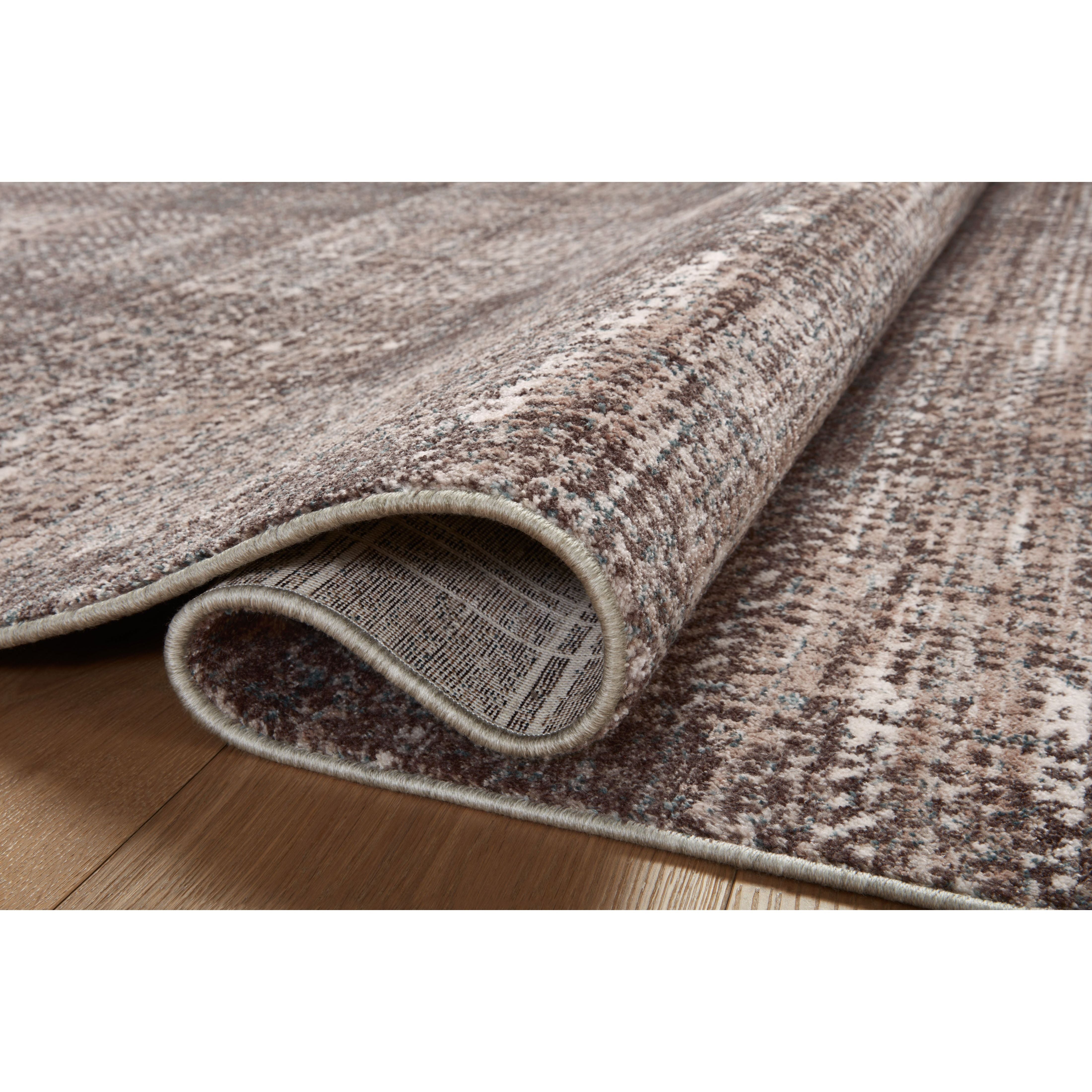 The Ember Collection by Angela Rose x Loloi is a modern flatweave area rug with a timeless plaid pattern that adds depth and coziness to any living room, bedroom, dining room, or hallway. Ember is power-loomed of 100% space-dyed polyester, a durable construction that creates a nuanced depth of color, available in a range of neutral palettes. Amethyst Home provides interior design, new home construction design consulting, vintage area rugs, and lighting in the Los Angeles metro area.