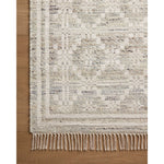 The Rivers Collection by Angela Rose x Loloi is a modern flatweave area rug with a reversible design featuring symmetrical motifs. Woven of wool, cotton, and jute, Rivers combines natural materials with an airy, natural aesthetic. The soft colors of the rug create a watercolor effect that adds artful depth to the neutral palette. Amethyst Home provides interior design, new home construction design consulting, vintage area rugs, and lighting in the Boston metro area.