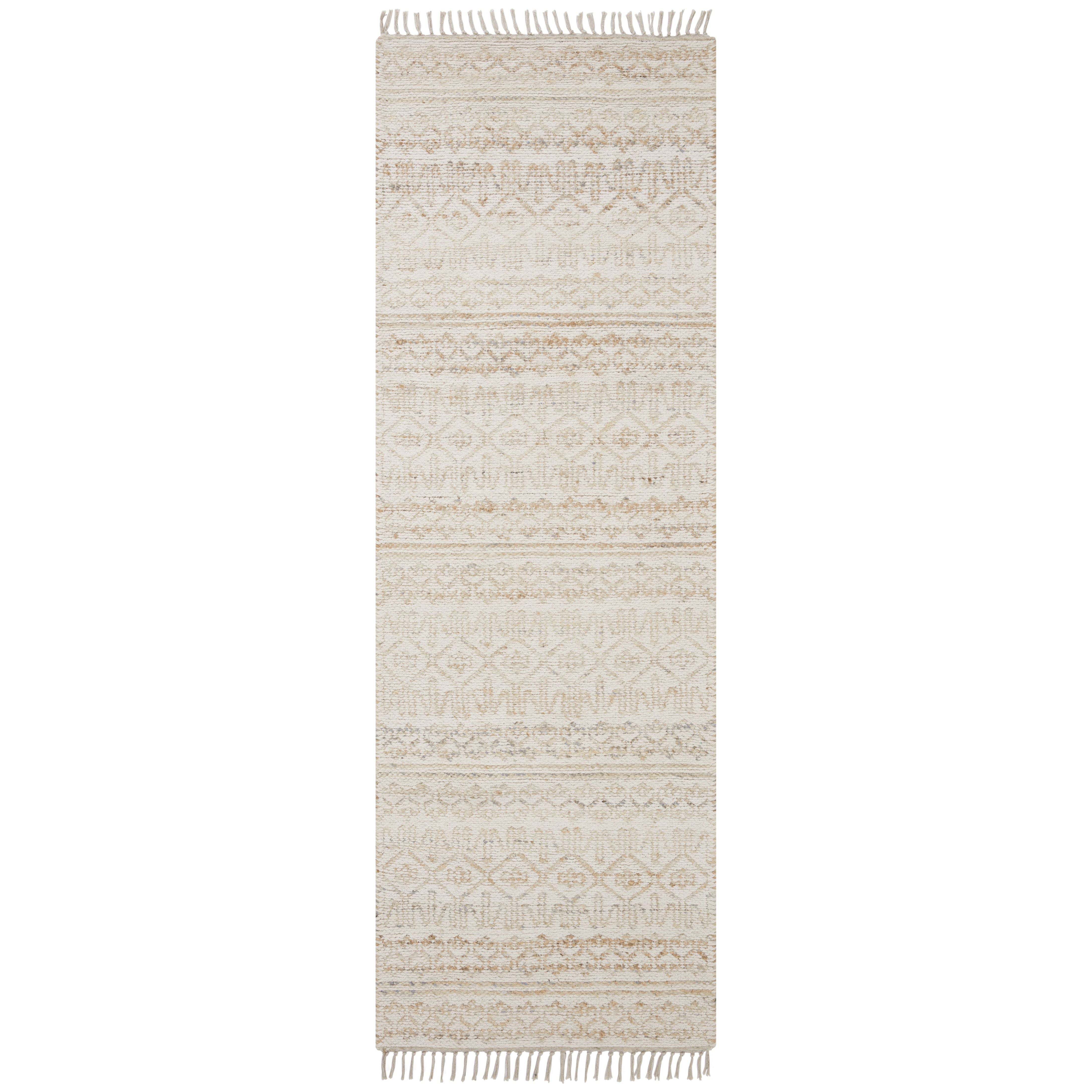 The Rivers Collection by Angela Rose x Loloi is a modern flatweave area rug with a reversible design featuring symmetrical motifs. Woven of wool, cotton, and jute, Rivers combines natural materials with an airy, natural aesthetic. The soft colors of the rug create a watercolor effect that adds artful depth to the neutral palette. Amethyst Home provides interior design, new home construction design consulting, vintage area rugs, and lighting in the Des Moines metro area.