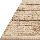 A tonal approach to Moroccan-inspired rugs, the Bodhi Ivory / Natural BOD-04 rug from Loloi is hand-woven of 100% jute. This rug features linear and braided details, creating natural variations that make a subtle yet striking statement for an entryway, living room, hallway or kitchen runner, or dining room. Amethyst Home provides interior design, new construction, custom furniture, and rugs for the Kansas City metro area.