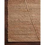 A tonal approach to Moroccan-inspired rugs, the Bodhi Natural / Natural BOD-05 rug from Loloi is hand-woven of 100% jute. This rug features linear and braided details, creating natural variations that make a subtle yet striking statement for an entryway, living room, hallway or kitchen runner, or dining room. Amethyst Home provides interior design, new construction, custom furniture, and rugs for the Nashville metro area.