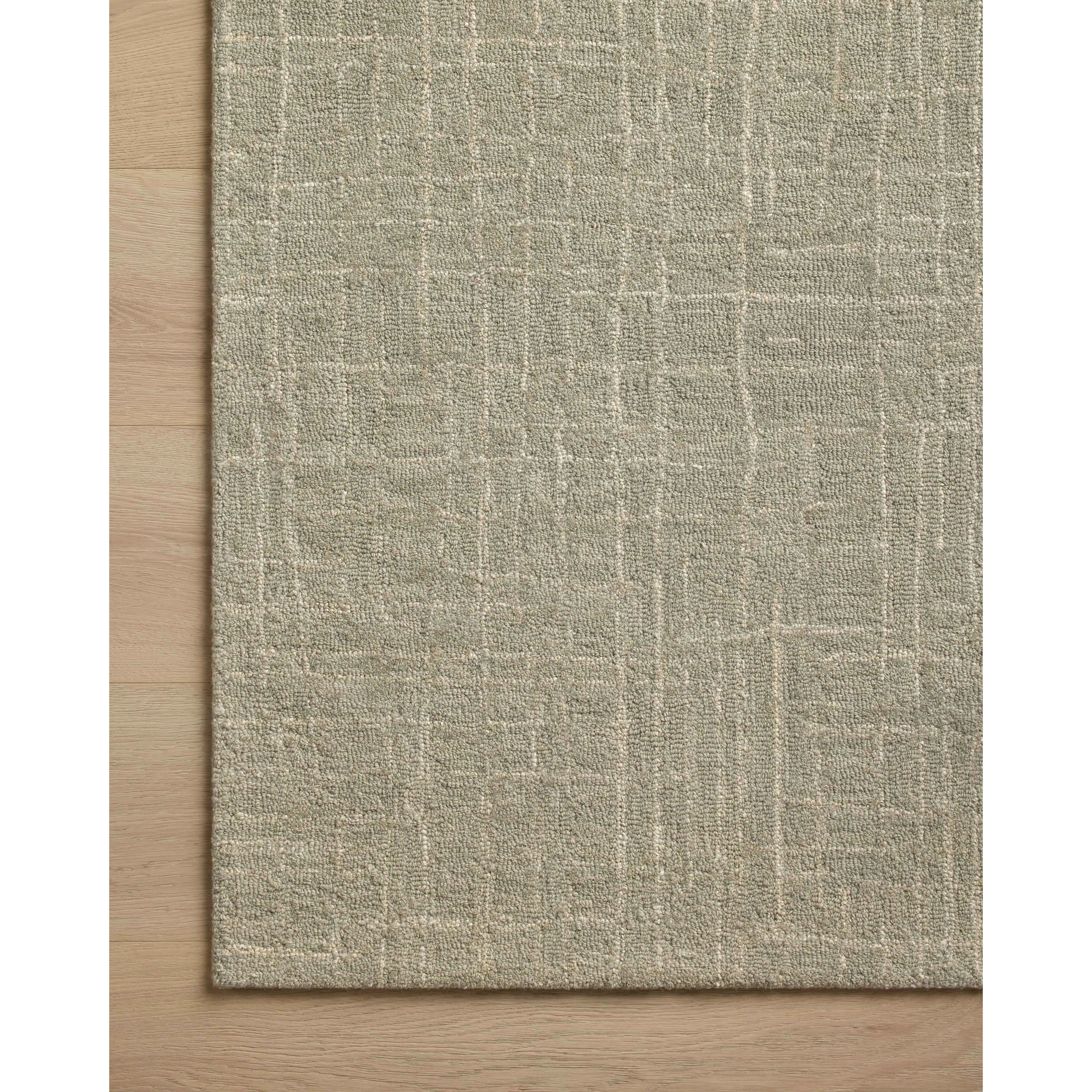 Featuring Chris Loves Julia x Loloi Polly Spa / Ivory Rug by Loloi at Amethyst Home. Hand-tufted of wool and jute pile, the Polly collection for Chris Loves Julia x Loloi brings a fresh take on modern yet classic designs. With striking gridded designs toned down by a neutral color palette, Polly is a timeless choice for any room. Polly is also GoodWeave certifi. Amethyst Home provides interior design, new home construction design consulting, vintage area rugs, and lighting in the Miami metro area.