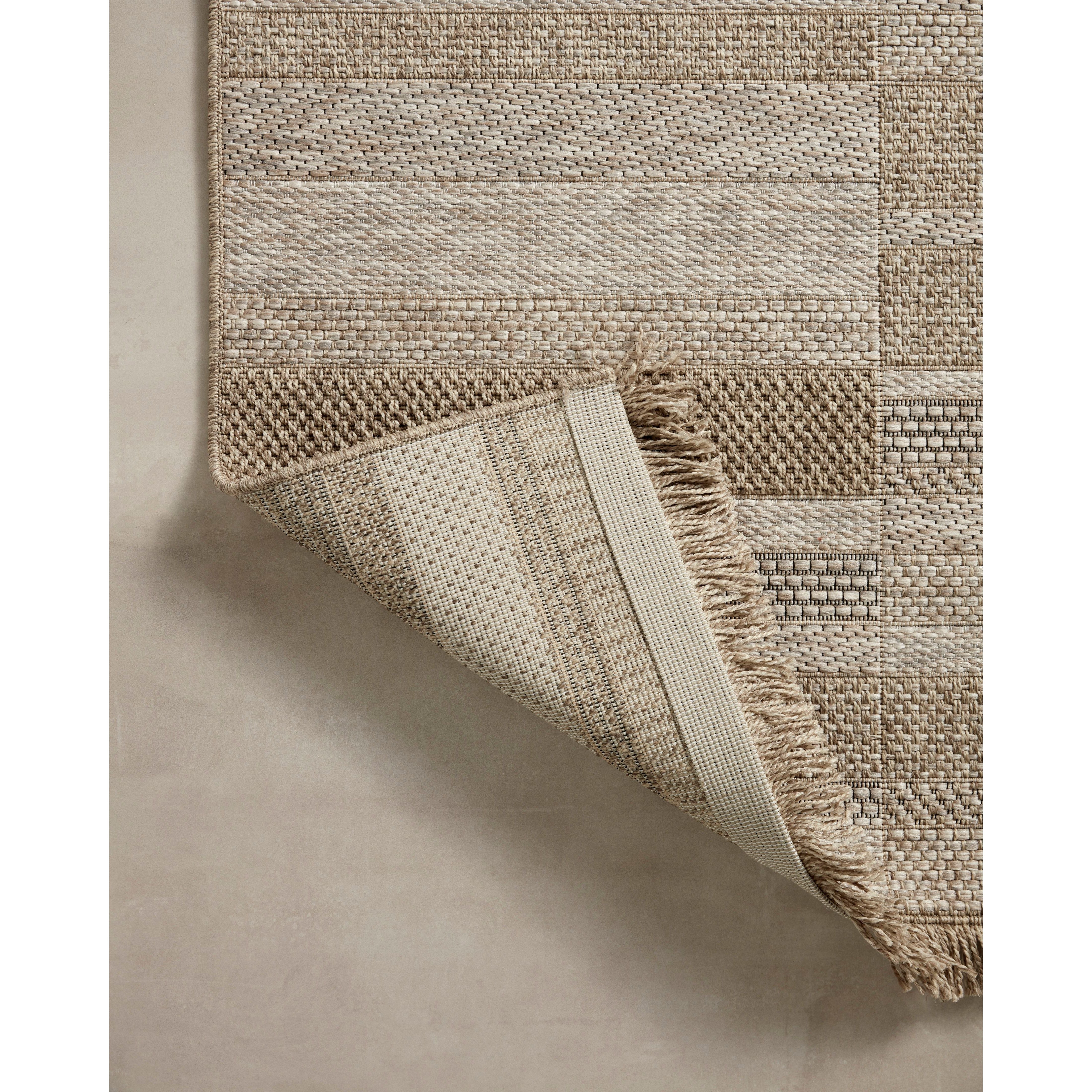 Featuring Dawn Natural DAW-03 Indoor/Outdoor Rug by Loloi at Amethyst Home. Made for sunny days ahead, the Dawn Collection is an indoor/outdoor rug that looks like a woven sisal rug but is power-loomed of 100% polypropylene, which makes it water- and mildew-resistant (so it's ready for rainy days ahead, too). Available in modern graphic patterns in tonal bei. Amethyst Home provides interior design, new home construction design consulting, vintage area rugs, and lighting in the Monterey metro area.