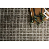 Featuring Giana Charcoal Rug by Loloi at Amethyst Home. Inspired by textural watercolors, the Giana Charcoal Rug from Loloi combines a relaxed grid with soft variations of grey and ivory for an effortless and sophisticated look. Each rug is hooked of 100% wool by artisans for a beautiful textural layer to your home. The soft textures of this rug bring warmth and coz. Amethyst Home provides interior design, new construction, custom furniture, and rugs for the Austin, Dallas, and Houston metro area.