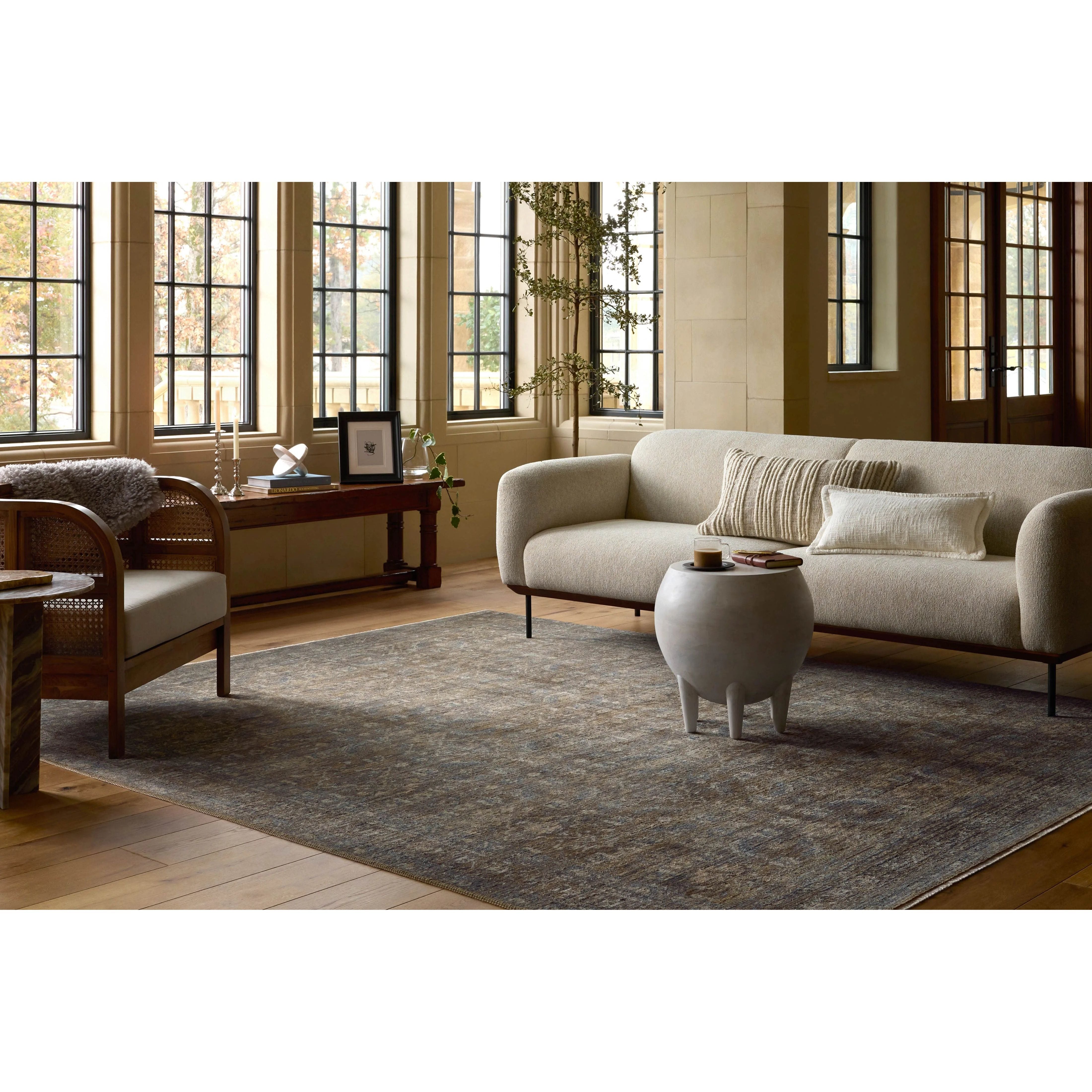 Featuring Heritage Lagoon / Tobacco Rug by Loloi at Amethyst Home. Heritage is Loloi’s best collection yet. Inspired by Amir Loloi’s favorite vintage rugs, the collection recreates a vintage aesthetic and variable-pile texture using a new craft process that was invented specifically for this rug—a process that took over two years to complete. Motifs in Heritage. Amethyst Home provides interior design, new home construction design consulting, vintage area rugs, and lighting in the Tampa metro area.