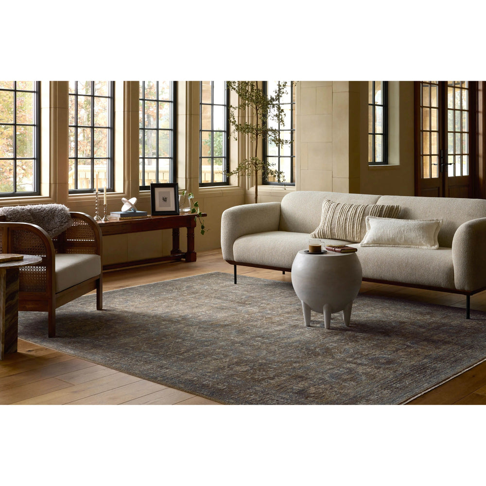 Featuring Heritage Lagoon / Tobacco Rug by Loloi at Amethyst Home. Heritage is Loloi’s best collection yet. Inspired by Amir Loloi’s favorite vintage rugs, the collection recreates a vintage aesthetic and variable-pile texture using a new craft process that was invented specifically for this rug—a process that took over two years to complete. Motifs in Heritage. Amethyst Home provides interior design, new home construction design consulting, vintage area rugs, and lighting in the Tampa metro area.