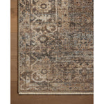 Featuring Heritage Mocha / Denim Rug by Loloi at Amethyst Home. Heritage is Loloi’s best collection yet. Inspired by Amir Loloi’s favorite vintage rugs, the collection recreates a vintage aesthetic and variable-pile texture using a new craft process that was invented specifically for this rug—a process that took over two years to complete. Motifs in Heritage . Amethyst Home provides interior design, new home construction design consulting, vintage area rugs, and lighting in the Seattle metro area.