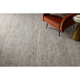 The Hendrick Grey Rug is a beautifully textured wool area rug with an elevated ease reminiscent of a cozy handmade sweater. The rug is very plush underfoot, making it equally welcome in bedrooms and living rooms. The hand-woven weave pattern adds dimension while the rug’s color palette is soft, neutral, and serene. Amethyst Home provides interior design, new construction, custom furniture, and area rugs in the Los Angeles metro area.