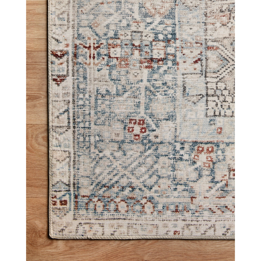 Durable, low pile, and soft underfoot, this rug is inspired by classic vintage and antique rugs. The Jules Chris Loves Julia Natural / Ocean JUL-07 rug from Loloi features a beautiful vintage pattern and patina. The rug is easy to clean and maintain and perfect for living rooms, dining rooms, hallways, and kitchens!