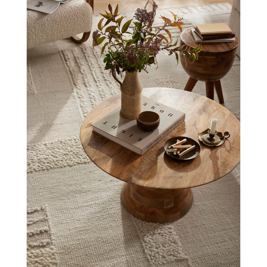Each area rug in the Manfred Ivory / Pebble Rug collection is meticulously hand-knotted with a technique that creates a high-low texture, adding visual depth and movement. The rug’s patchwork design is casually sophisticated, fitting into living rooms, bedrooms, and dens—anywhere a touch of texture is needed. Amethyst Home provides interior design, new home construction design consulting, vintage area rugs, and lighting in the Des Moines metro area.