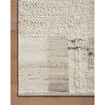Each area rug in the Manfred Natural / Stone Rug collection is meticulously hand-knotted with a technique that creates a high-low texture, adding visual depth and movement. The rug’s patchwork design is casually sophisticated, fitting into living rooms, bedrooms, and dens—anywhere a touch of texture is needed. Amethyst Home provides interior design, new home construction design consulting, vintage area rugs, and lighting in the Omaha metro area.