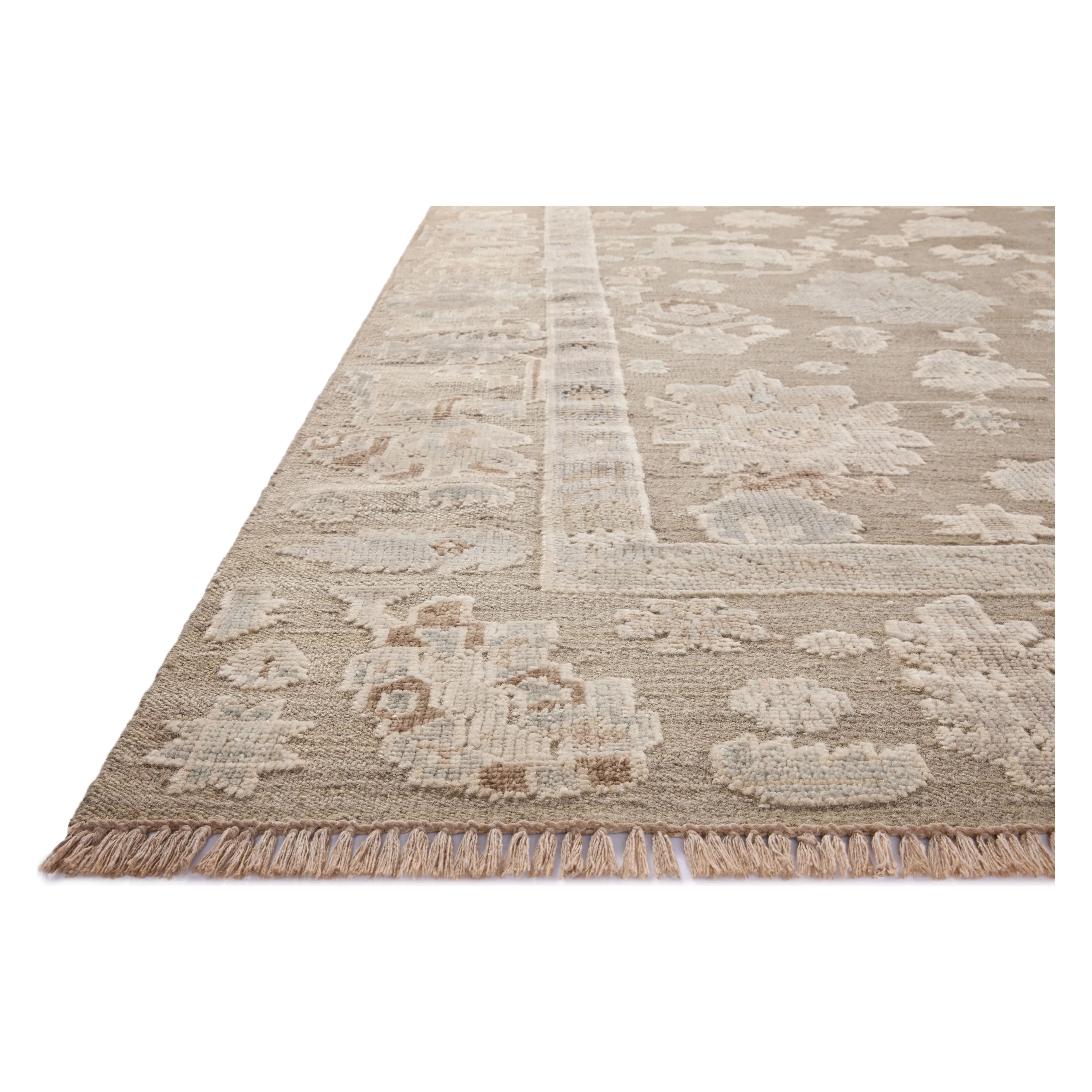 The Marianne Collection is a hand-knotted wool area rug with vintage medallion motifs and short edge fringe, inspired by many one-of-a-kind pieces. The rugâ€™s elegantly neutral palette feels modern, while the rugâ€™s overall aesthetic is timeless. Amethyst Home provides interior design, new home construction design consulting, vintage area rugs, and lighting in the San Diego metro area.