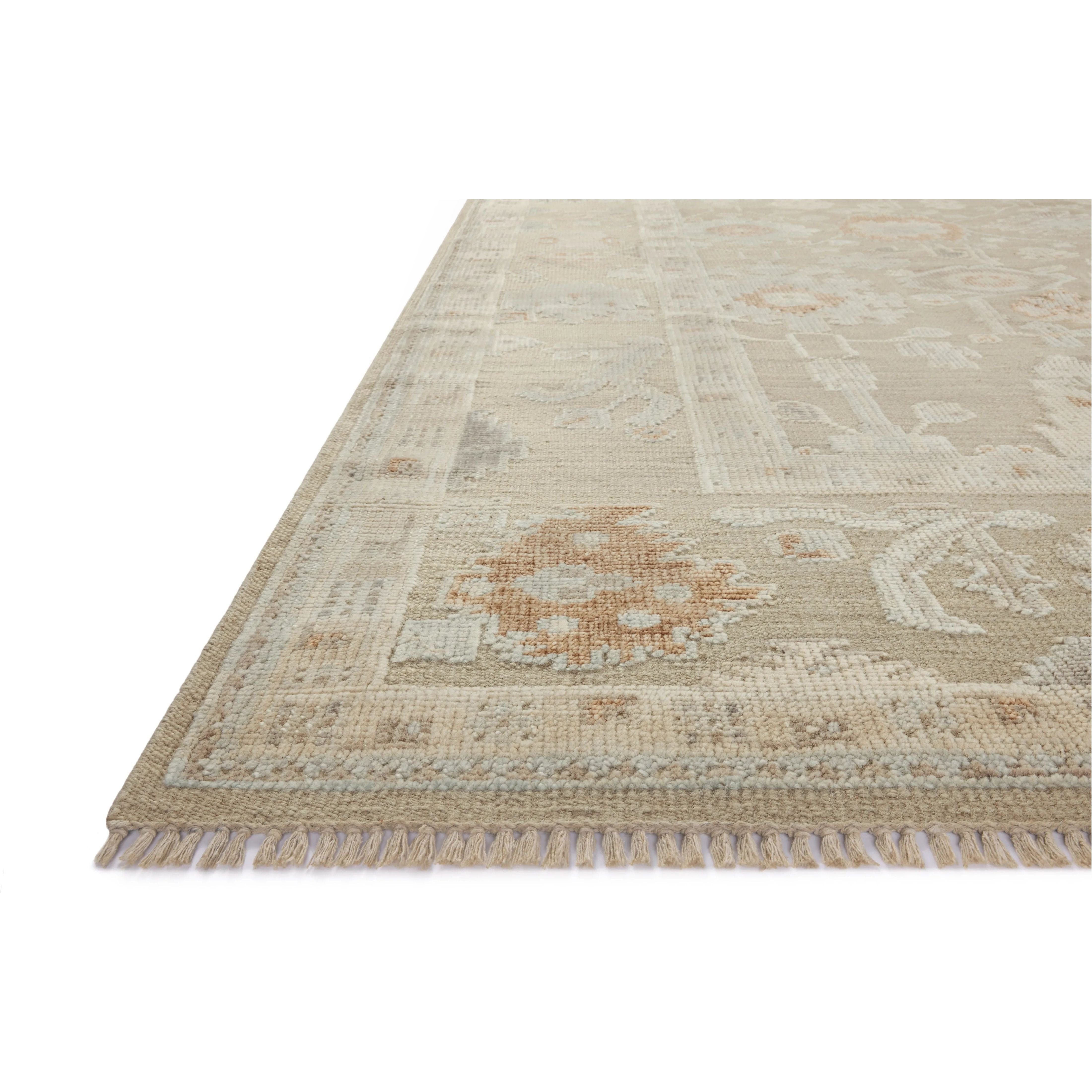 The Marianne Collection is a hand-knotted wool area rug with vintage medallion motifs and short edge fringe, inspired by many one-of-a-kind pieces. The rugâ€™s elegantly neutral palette feels modern, while the rugâ€™s overall aesthetic is timeless. Amethyst Home provides interior design, new home construction design consulting, vintage area rugs, and lighting in the Alpharetta metro area.
