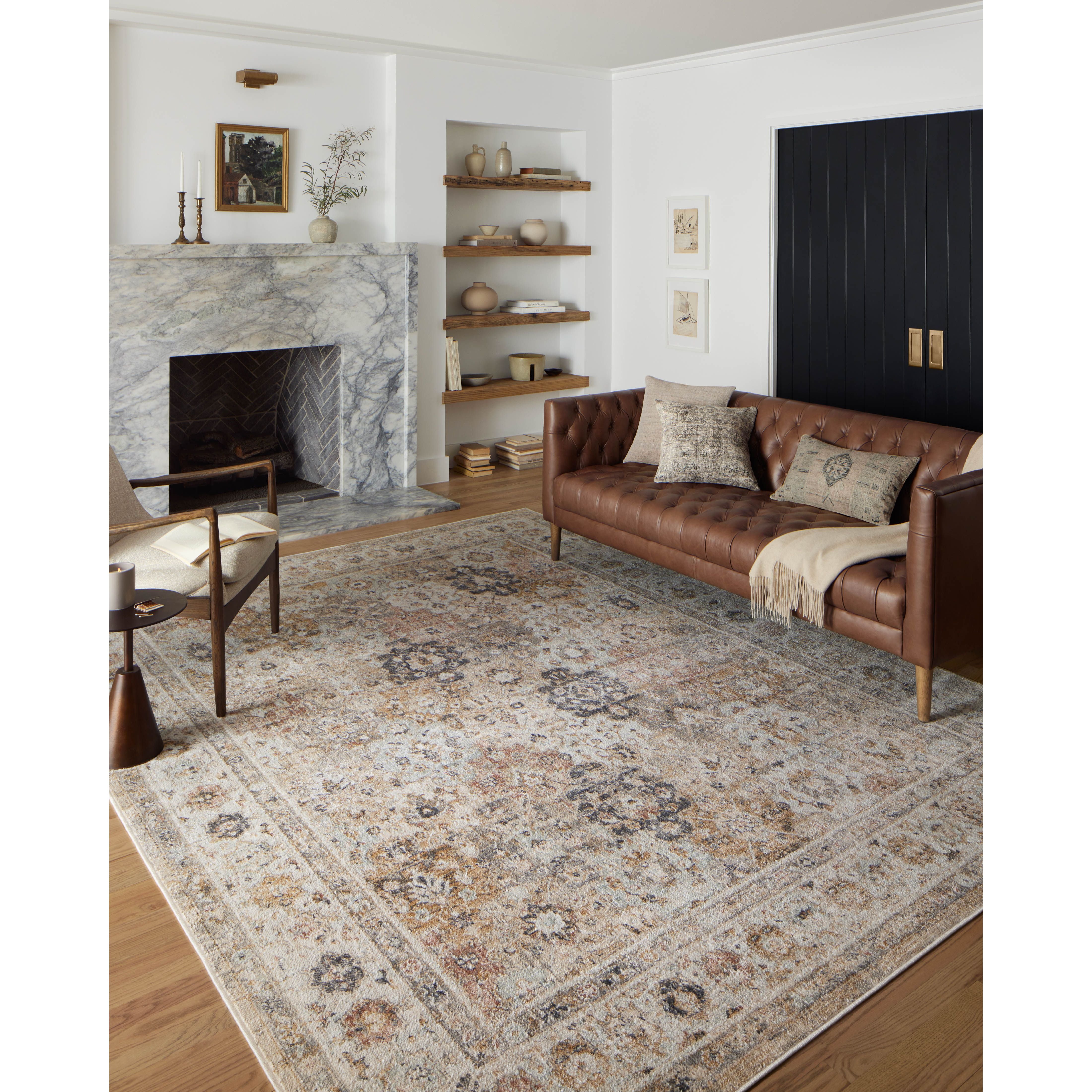 Inspired by antique Turkish Oushak carpets with large-scale motifs, the Monroe Beige / Multi Rug modernizes the traditional design in neutral palettes, many of which have black details that anchor the rug in the room. Monroe is power-loomed of 100% polypropylene for easy care and reliable durability. Amethyst Home provides interior design, new home construction design consulting, vintage area rugs, and lighting in the San Diego metro area.