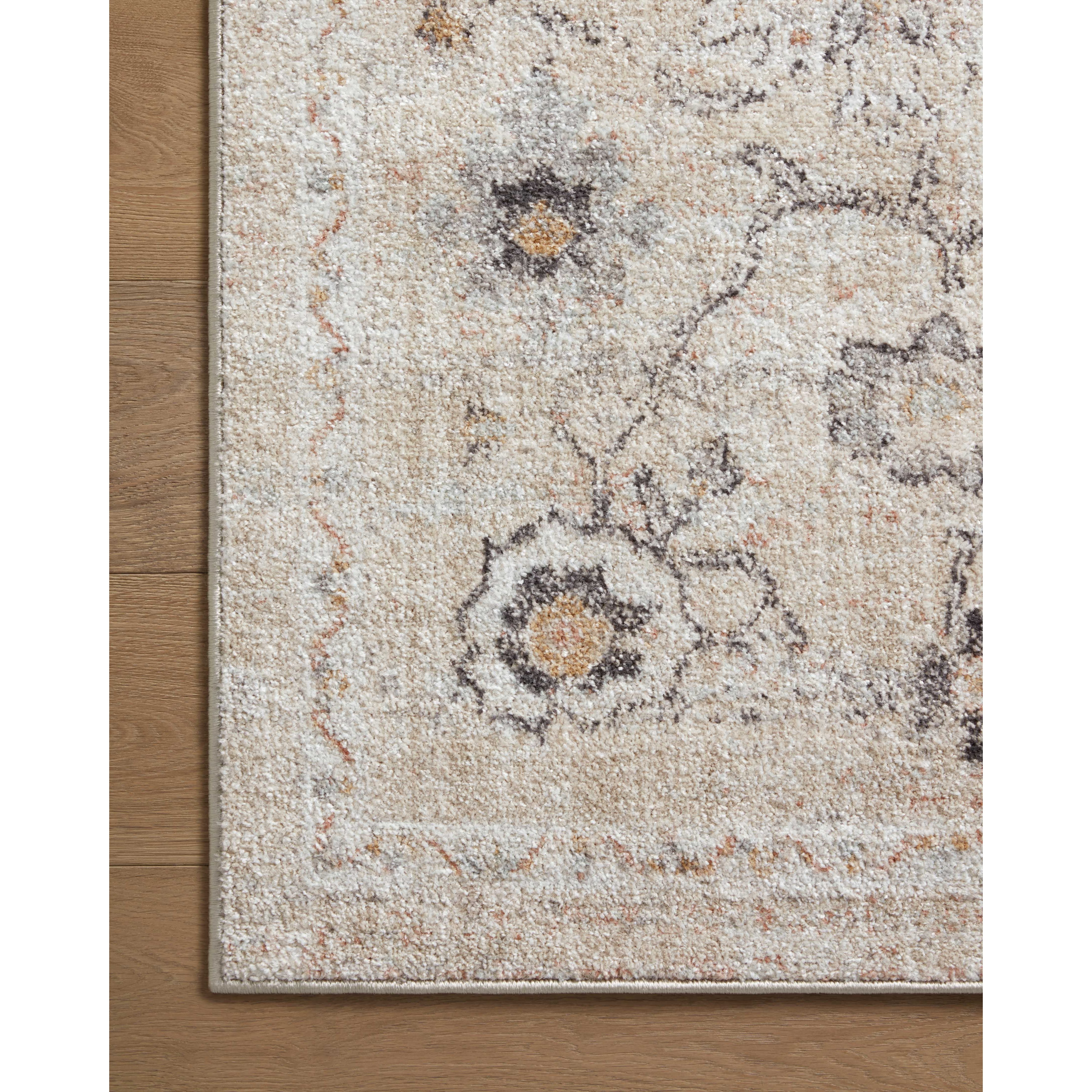 Inspired by antique Turkish Oushak carpets with large-scale motifs, the Monroe Natural / Multi Rug modernizes the traditional design in neutral palettes, many of which have black details that anchor the rug in the room. Monroe is power-loomed of 100% polypropylene for easy care and reliable durability. Amethyst Home provides interior design, new home construction design consulting, vintage area rugs, and lighting in the Dallas metro area.