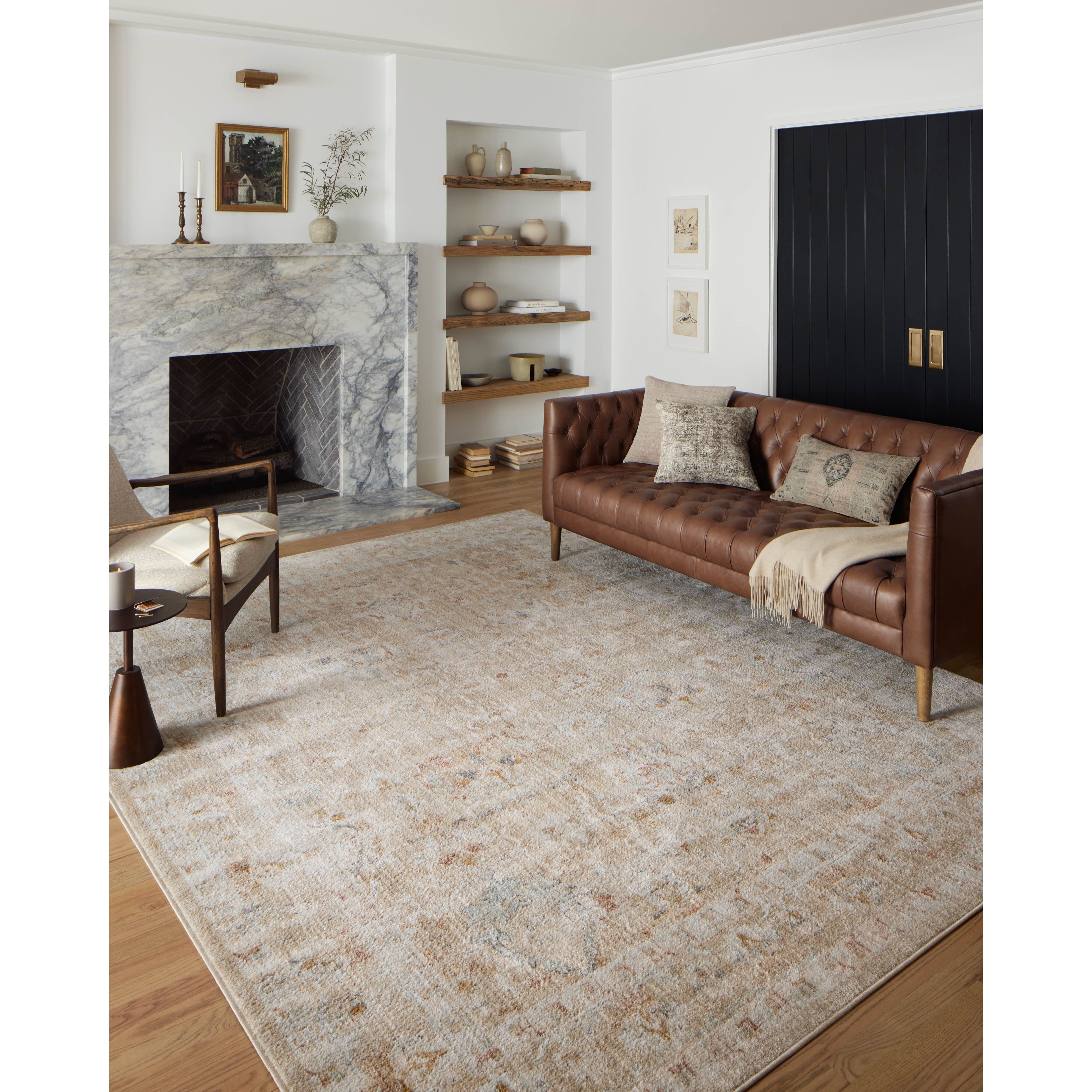 Inspired by antique Turkish Oushak carpets with large-scale motifs, the Monroe Sand / Sunrise Rug modernizes the traditional design in neutral palettes, many of which have black details that anchor the rug in the room. Monroe is power-loomed of 100% polypropylene for easy care and reliable durability. Amethyst Home provides interior design, new home construction design consulting, vintage area rugs, and lighting in the Alpharetta metro area.