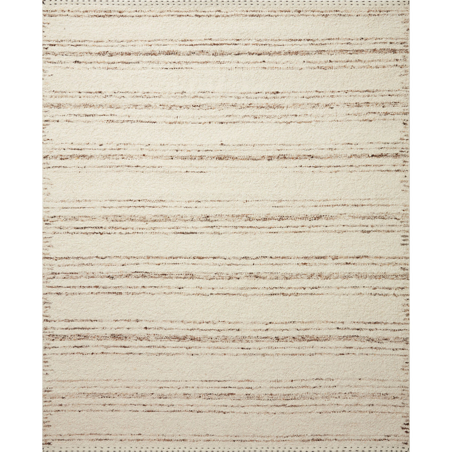 A perfect blend of refined and relaxed, the Roman Ivory / Pebble ROM-02 rug from Loloi is hand woven of wool, cotton and viscose by skilled artisans. Designs with meticulously placed strokes elevate any area such as an entryway, living room, dining room, or bedroom. Each piece is finished with a unique stitched edge. Amethyst Home provides interior design, new construction, custom furniture, and rugs for the Omaha and Lincoln, Nebraska metro area.