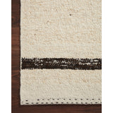 A perfect blend of refined and relaxed, the Roman Natural / Bark ROM-01 rug from Loloi is hand woven of wool, cotton and viscose by skilled artisans. Designs with meticulously placed strokes elevate any area such as an entryway, living room, dining room, or bedroom. Each piece is finished with a unique stitched edge. Amethyst Home provides interior design, new construction, custom furniture, and rugs for the Austin, Dallas, and Houston, Texas metro area.