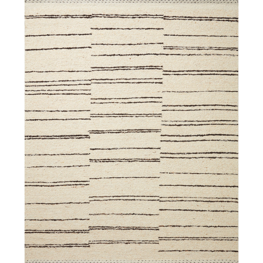 A perfect blend of refined and relaxed, the Roman Natural / Charcoal ROM-04 rug from Loloi is hand woven of wool, cotton and viscose by skilled artisans. Designs with meticulously placed strokes elevate any area such as an entryway, living room, dining room, or bedroom. Each piece is finished with a unique stitched edge. Amethyst Home provides interior design, new construction, custom furniture, and rugs for the Omaha and Lincoln, Nebraska metro area.
