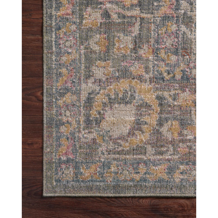 Durable, low pile, and soft underfoot, this rug is inspired by classic vintage and antique rugs. The Rosemarie Chris Loves Julia Stone / Multi ROE-01 rug from Loloi features a beautiful vintage pattern and patina. The rug is easy to clean, never sheds, and perfect for living rooms, dining rooms, hallways, and kitchens!