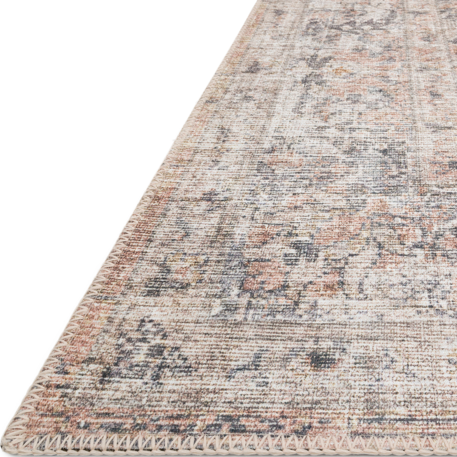 The Skye Blush/Grey SKY-01 area rug by Loloi, is timeless and classic with a beautiful, old-world design in tones of blush, grey, and ivory. Power-loomed of 100% polyester, this rug is great with families and pets. This rug is perfect for kitchens, dining rooms, entry ways, or anywhere high traffic. Amethyst Home provides interior design, new construction, custom furniture, and rugs for the Kansas City metro area.