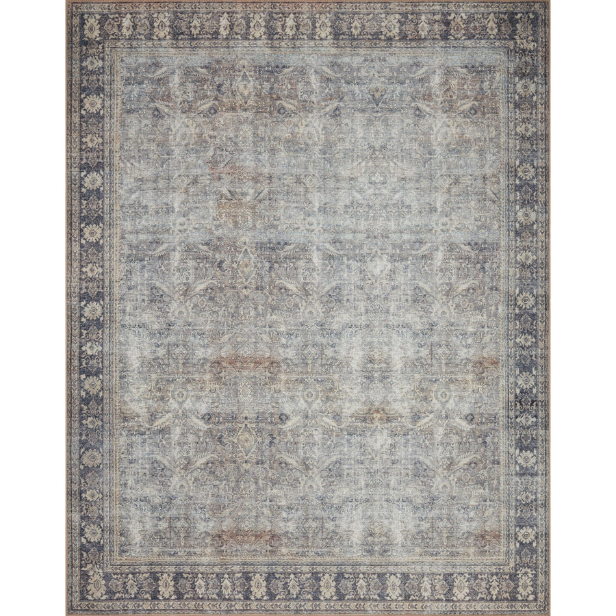 The Wynter Grey / Charcoal WYN-07 area rug showcases a one-of-a-kind vintage or antique area rug look power-loomed of 100% polyester. This rug brings in tones of silver, blue, and tan. The rug is ideal for high traffic areas due to the rug's durability for living rooms, dining rooms, kitchens, hallways, and entryways. Amethyst Home provides interior design, new construction, custom furniture, and rugs for the Austin, Dallas, and Houston Texas metro area.