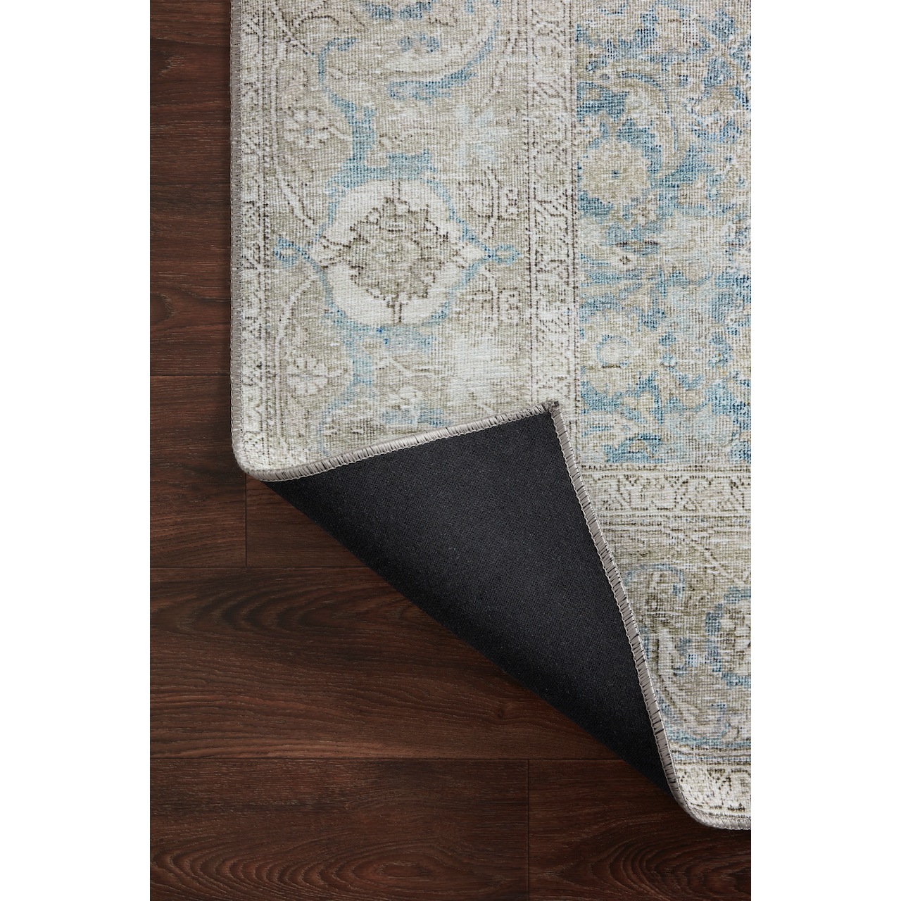 Power-loomed of 100% polyester, the Wynter Ocean / Silver WYN-10 area rug from Loloi showcases a one-of-a-kind vintage or antique area rug look at an affordable price. The rug is ideal for high traffic areas due to the rug's durability making it perfect for living rooms, dining rooms, kitchens, hallways, entryways. Amethyst Home provides interior design, new construction, custom furniture, and rugs for the Salt Lake City and Park Place, Utah metro area.