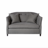 The Luccia Upholstered Sofa Family is a perfect cosy bedroom piece. The Luccia features subtle pin tufting on the inside back with a comfortable bench seat to settle into. The double-stitch back and high, curved arms add make this charismatic sofa utterly unique. Photographed in Brevard Pewter and Matteo Dark Grey. 