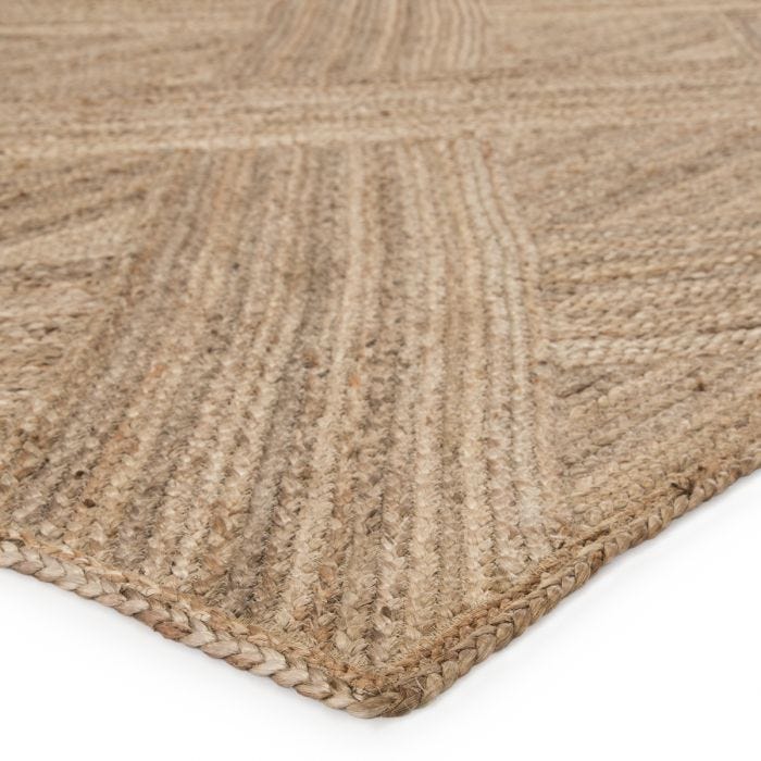 The Naturals Tobago Vero rug from Jaipur Living delivers rich texture and organic allure to contemporary homes. The Vero area rug showcases a distinctive diagonal weave design, hand woven of jute. The warm colors of honey and tan of this stunning natural jute rug lends a grounding, boho vibe to any space as either a runner or area rug.