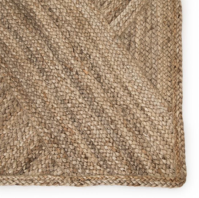 The Naturals Tobago Vero rug from Jaipur Living delivers rich texture and organic allure to contemporary homes. The Vero area rug showcases a distinctive diagonal weave design, hand woven of jute. The warm colors of honey and tan of this stunning natural jute rug lends a grounding, boho vibe to any space as either a runner or area rug.