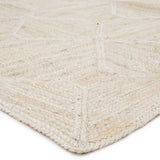 The Naturals Tobago collection delivers rich texture and organic allure to contemporary homes. The Sisal Bow NAT41  rug showcases a chic diamond trellis design, hand woven of jute. The mix of ivory and golden tones on this stunning rug lends a contemporary vibe to any living room, dining room, kitchen, or hallway!