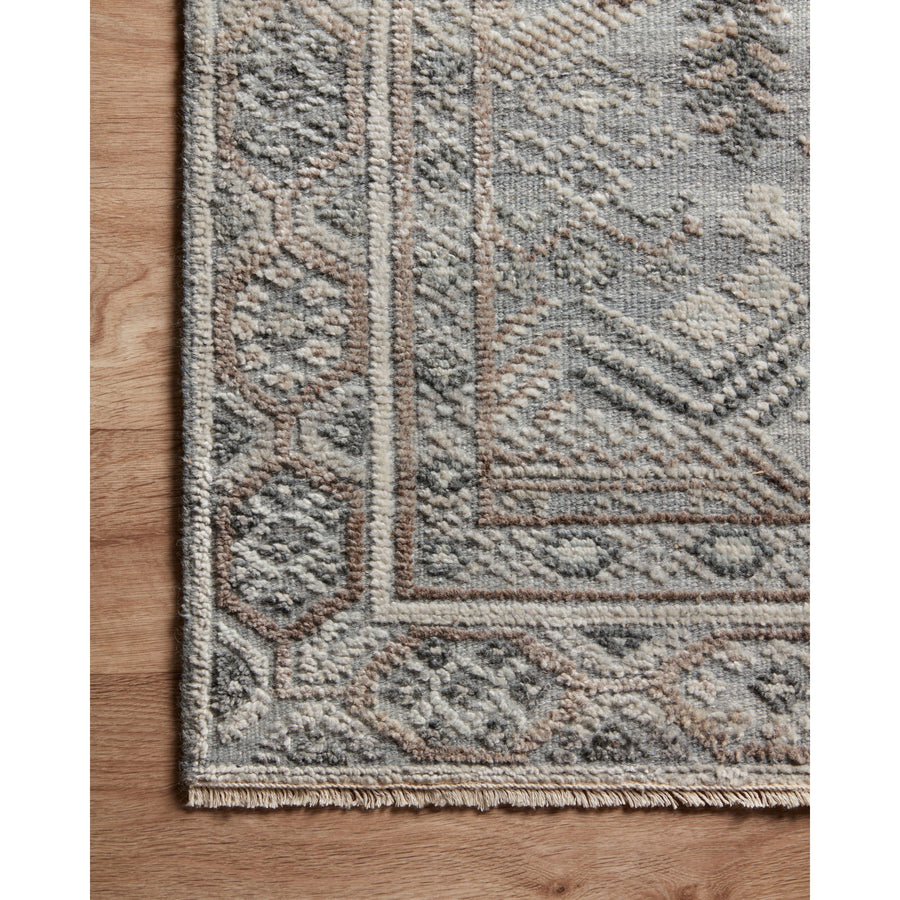Timeless yet modern, the Nola Slate / Granite Area Rug, or NOL-01, is hand-knotted in India of viscose, cotton, wool and other fibers. The tonal collection showcases an elevated texture, accentuating the pattern in every piece. 