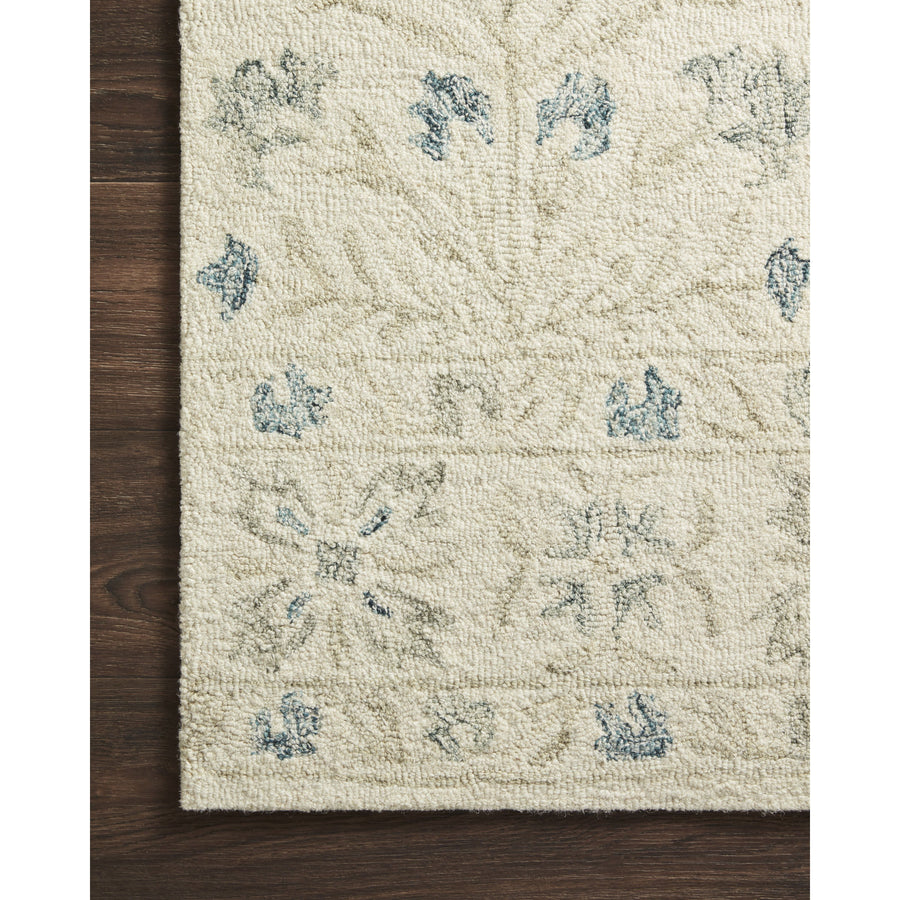 Norabel Ivory/Grey Rug - Amethyst Home Hooked of 100% wool pile by skilled artisans in India, the Norabel Collection feels naturally soft underfoot. Norabel features designs that balance botanical motifs in delicate, variegated colors that resonate for today's home.
