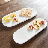 Sleek and simple, this set of oval marble trays are a great addition to any kitchen. An elegant way to serve guests an array of cheese, crackers & fruit. Amethyst Home provides interior design, new construction, custom furniture, and area rugs in the Washington metro area.