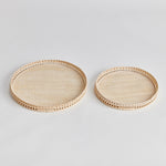 In a woven rattan with a fresh whitewash finish, these substantial, coastal-inspired trays are a welcomed accent in any setting. Perfect for coffee table or ottoman to create a base for a stunning vignette. Amethyst Home provides interior design, new construction, custom furniture, and area rugs in the Charlotte metro area.