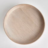 Contemporary and uniquely designed, this footed bowl is made of mango wood. Makes a beautiful serving bowl for dry foods, as well as a gorgeous centerpiece all on its own. Amethyst Home provides interior design, new construction, custom furniture, and area rugs in the Kansas City metro area.