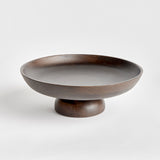 Contemporary and uniquely designed, this footed bowl is made of mango wood. Makes a beautiful serving bowl for dry foods, as well as a gorgeous centerpiece all on its own. Amethyst Home provides interior design, new construction, custom furniture, and area rugs in the Portland metro area.