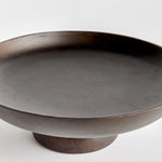 Contemporary and uniquely designed, this footed bowl is made of mango wood. Makes a beautiful serving bowl for dry foods, as well as a gorgeous centerpiece all on its own. Amethyst Home provides interior design, new construction, custom furniture, and area rugs in the Scottsdale metro area.
