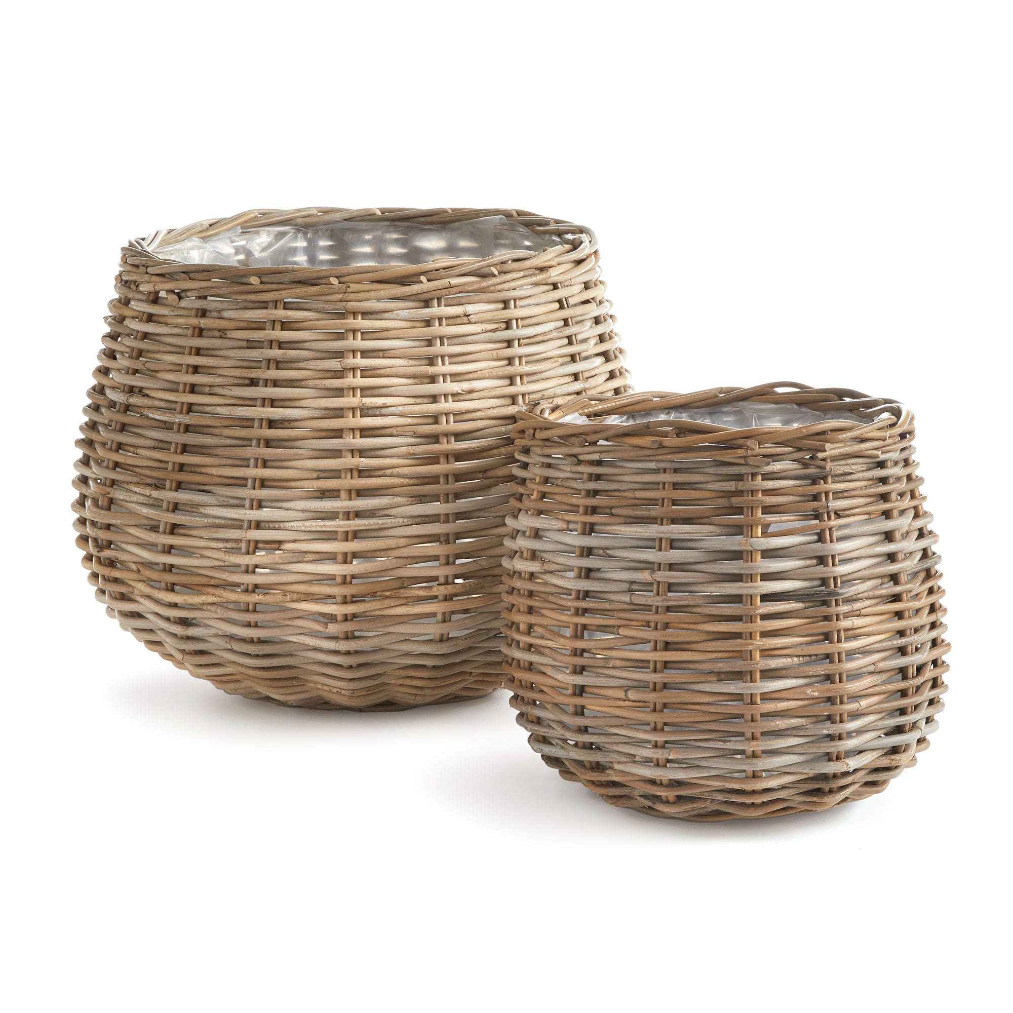 Beautifully woven rattan baskets, largescale and lined with a thick plastic, how smart! The perfect vessels for your favorite tree or large leafy plants. Amethyst Home provides interior design, new construction, custom furniture, and area rugs in the Park City metro area.