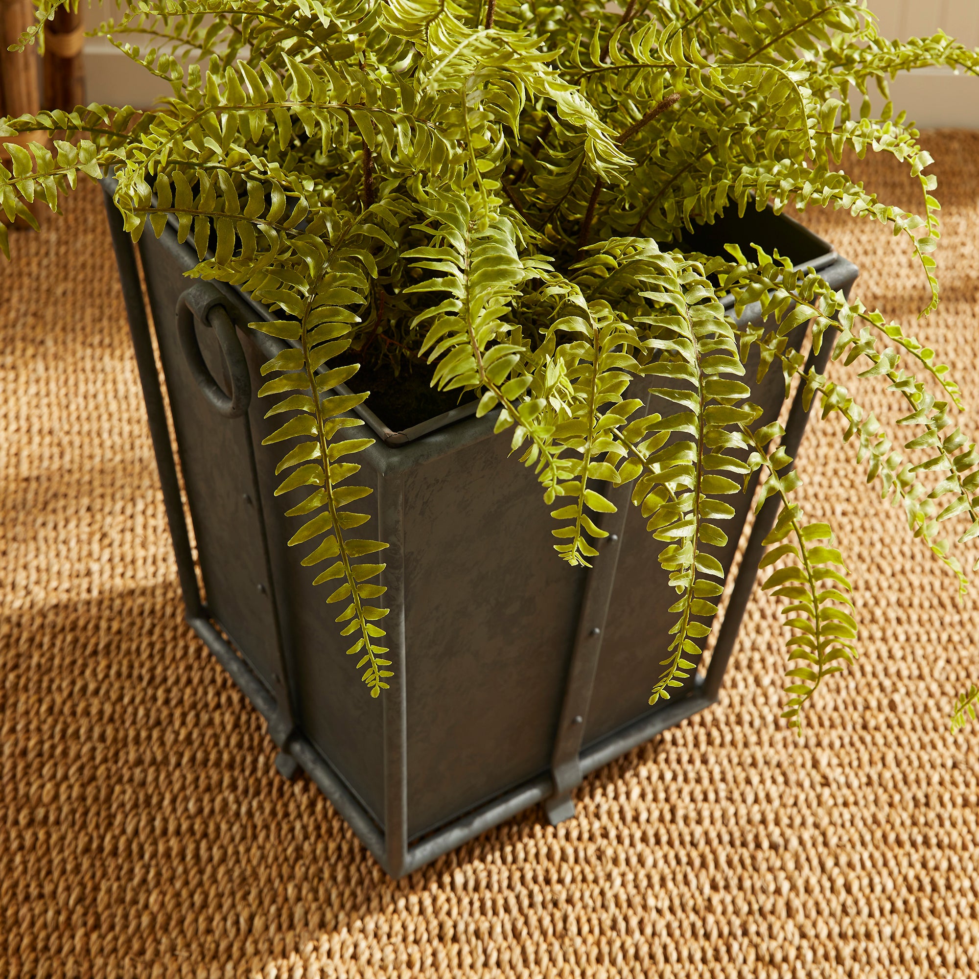 With metal liners that easily slide out, the Callahan Tapered Planter is as practical as it is handsome. The rounded handles and traditional design make it an outdoor classic. Amethyst Home provides interior design, new construction, custom furniture, and area rugs in the Nashville metro area.
