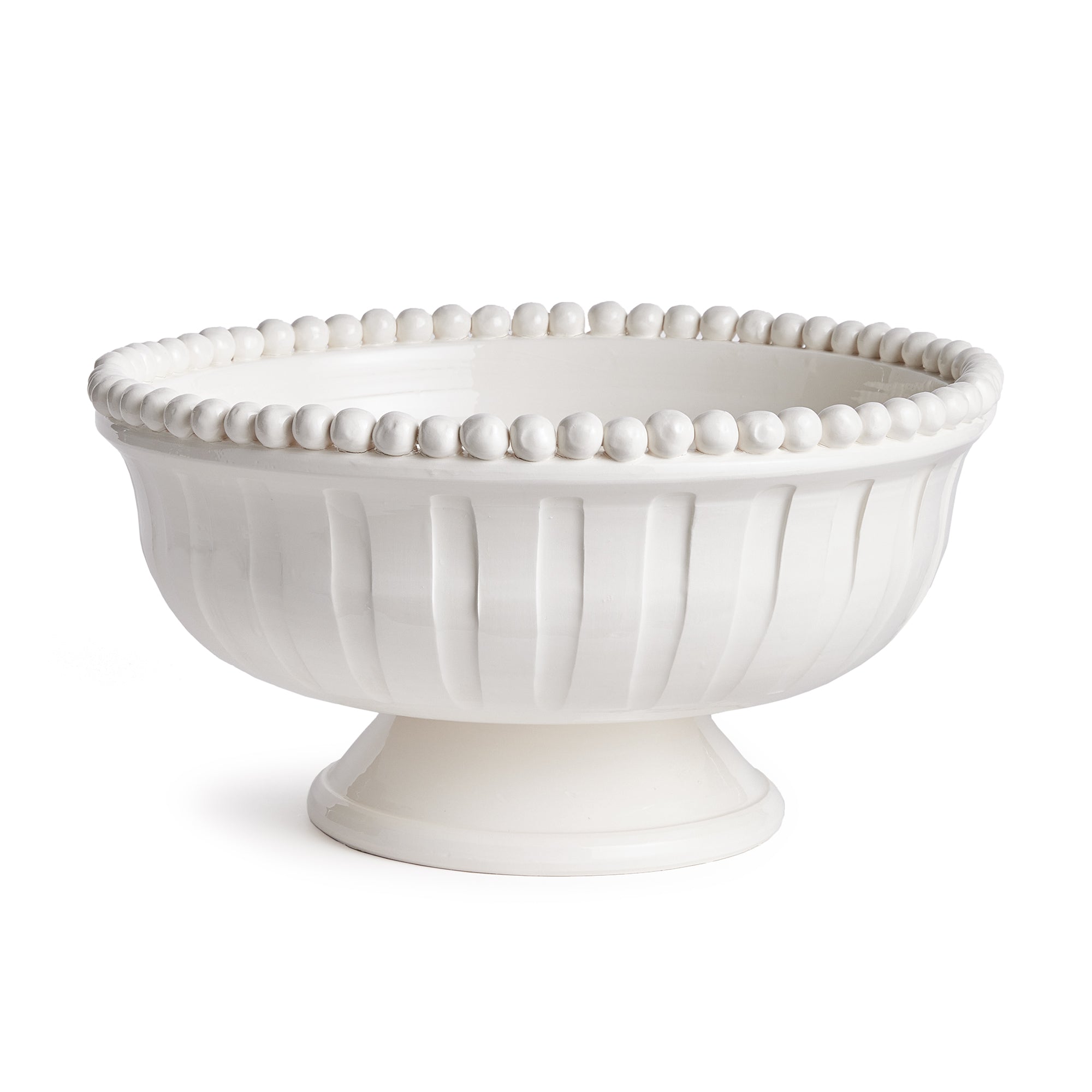 The Coletta Decorative Footed Low Bowl is handmade by Italian artisans in Tuscany, Italy. The subtle ribbing and hand-applied beading are made with genuine attention to detail. With a classic Italian craftsmanship passed down through generations, each piece is a true original. Amethyst Home provides interior design, new construction, custom furniture, and area rugs in the Houston metro area.