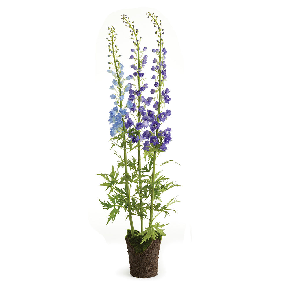 Florals are an essential design element. If done right, they can make all the difference. These potted Delphiniums add height and soothing pop of violet to any space. Amethyst Home provides interior design, new construction, custom furniture, and area rugs in the Seattle metro area.