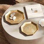 A geometric shape and sleek look make these cast aluminum trays unique. Line with a collection of candles for a golden, contemporary touch. They are dry food safe, so serve your favorite muffins or rolls in style at your next gathering. Amethyst Home provides interior design, new construction, custom furniture, and area rugs in the Miami metro area.